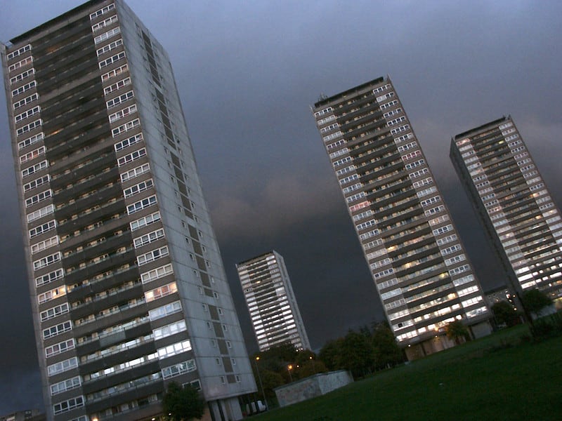 High-rise blocks. Glasgow housing scheme, in cloudy dusk sky. Inner city/urban deprivation.